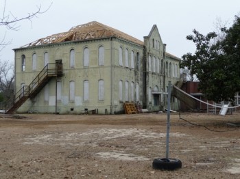 Eaton School in Feb 2010, the second try after missing the mark with the first set of trusses. Let uncovered like this for weeks.