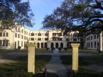 Gulf Park College (Gulf Park campus, USM), Long Beach (1921-1926). Founded as a junior college for girls east of downtown Long Beach, the remaining three buildings on the front campus are both architecturally and historically significant. With two buildings designed by New Orleans architect Rathbone Debuys and the third by Jackson architect N.W. Overstreet, the buildings maintain a Spanish style popular on the Gulf Coast in the 1920s. Unfortunately, as part of the designation, the MDAH Board of Trustees agreed to allow the demolition of Debuys' Administration Building, leaving only two original buildings on the campus.