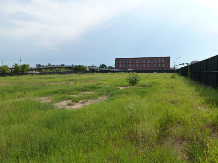 For kicks, I checked in on the grassy lot that held the Meridian Hotel until last year. Here's how it looked as of August 2012. I'm sure that arts and entertainment center is just about to get underway, any minute now.