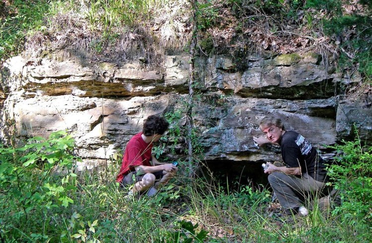 Figure 8. Cavett Taff (right) and his son Philip examining a Catahoula sandstone ledge at the old state stone quarry at Mississippi Springs east of Raymond, Mississippi. Picture (digital) taken on September 20, 2007.