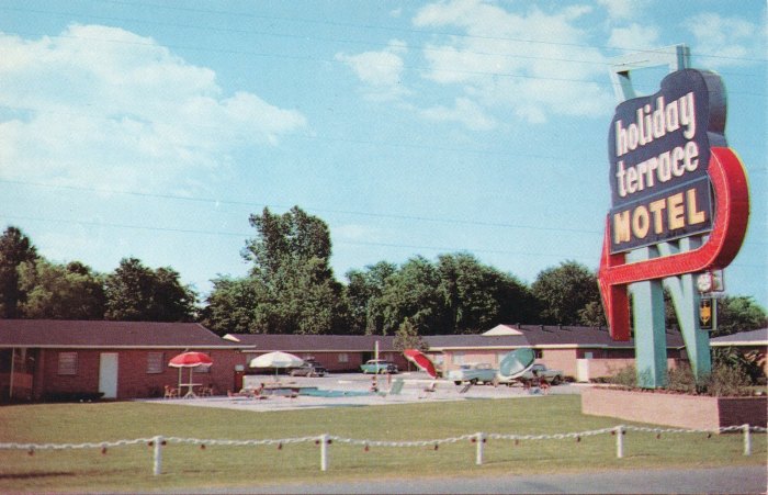 holiday terrace MOTEL. Highway 80 West, 1 1/2 Miles. Phone FLeetwood 2-5011 Teletype JN-81. Jackson, Mississippi. Air-Conditioned--Room Telephones--Television--Swimming Pool--Johnny's Restaurant on Property. Master Host. AAA.