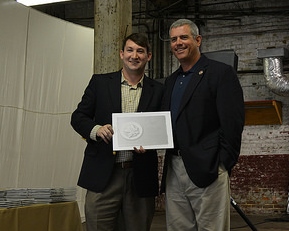 MHT President Brad Reeves presents Speaker of the House Philip Gunn with the Libby Aydelott Award for Outstanding Achievement in Public Policy for his championship of the state historic tax credit at the Heritage Awards Luncheon on June 10 in Tupelo.