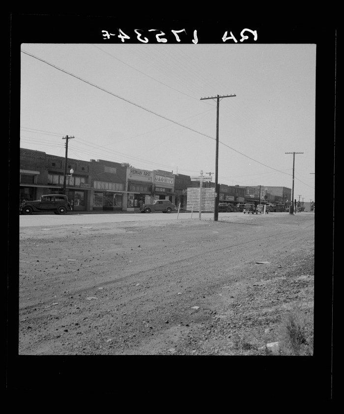 Main street. Drew, Mississippi. Dorothea Lange, photographer. Date Created: 1937 June-July. Medium: 1 negative : nitrate ; 2 1/4 x 2 1/4 inches or smaller.
