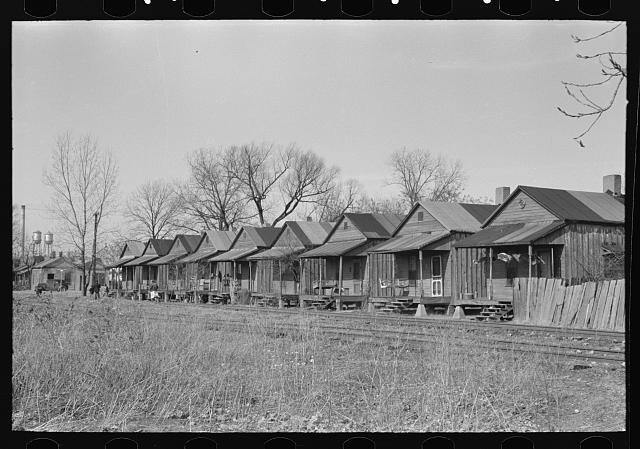 Housing across the railroad tracks, Greenville, Mississippi. Lee, Russell (1903-1986), photographer Date Created: 1939 Jan. Medium: 1 negative : nitrate ; 35 mm.