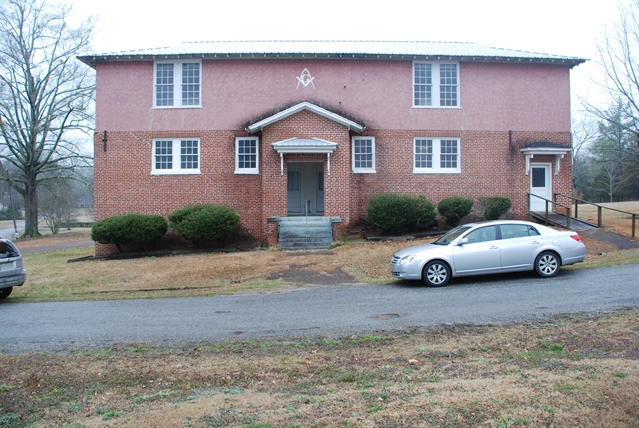 This two-story, asymmetrical, rectangular Craftsman style building was constructed in 1925. The first floor of the building was used as the West Grammar School, while the second floor housed the masonic lodge. The West Civic Club hosts annual reunions for the alumni of the grammar school, which provide funding for the upkeep of the building. The building retains many of its original architectural features including windows, doors, floor plan and some cabinetry. The West Civic Club requests Mississippi Landmark designation. Designated by MDAH Board of Trustees on April 17, 2015.