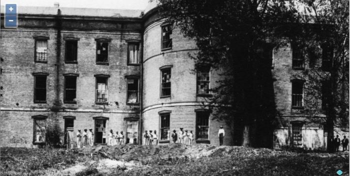 This remarkable photo in the MDAH Daniels collection shows convicts at the back of the Old Capitol. It was probably taken after April 1916 and shows convicts engaged in the labor that the Legislature had directed in their bill to renovate the Old Capitol. The photo at the MDAH Al Fred Daniel Collection shows the stripes on the convicts pants. 